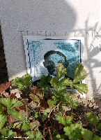 .....and his photograph beside it