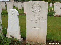 The headstone and memorial to Captain Teague, Bazentin-le-Petit Military Cemetery