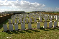 Longueval Road Cemetery with Bernafay Wood visible behind