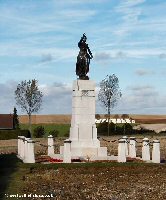Memorial to the 34th Division with Ovillers Military Cemetery in the background