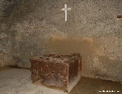 Rusting remains of an oven in the boulongerie