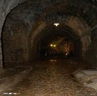 A cobbled section of the corridor leads to the German Cemetery
