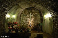 A cross on the wall......behind which are the remains of 679 German soldiers
