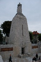 The tall column with the word 'Verdun' near the top