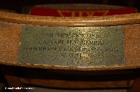 Brass plaque on chair in memory of Captain Skrine