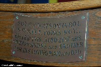 Brass plaque on chair in memory of Serjeant George Watson