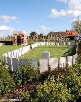 The loop of special memorial headstones at the front of the cemetery