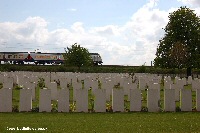 Train passing Railway Dugouts Burial Ground (Transport Farm)