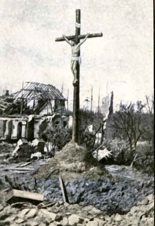 A Crucifix at Neuve Chapelle still standing amidst the ruins