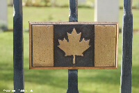 Maple leaf on the gate denotes the Canadian nature of the cemetery
