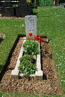 The full length grave of Lieutenant Griffin of the Gloucesters in Bazentin-le-Petit Communal Cemetery